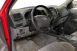 punainen Toyota Hilux 2009 kuva 3.