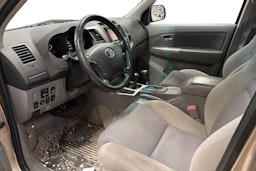 Ruskea (beige) Toyota Hilux 2010 kuva 3.