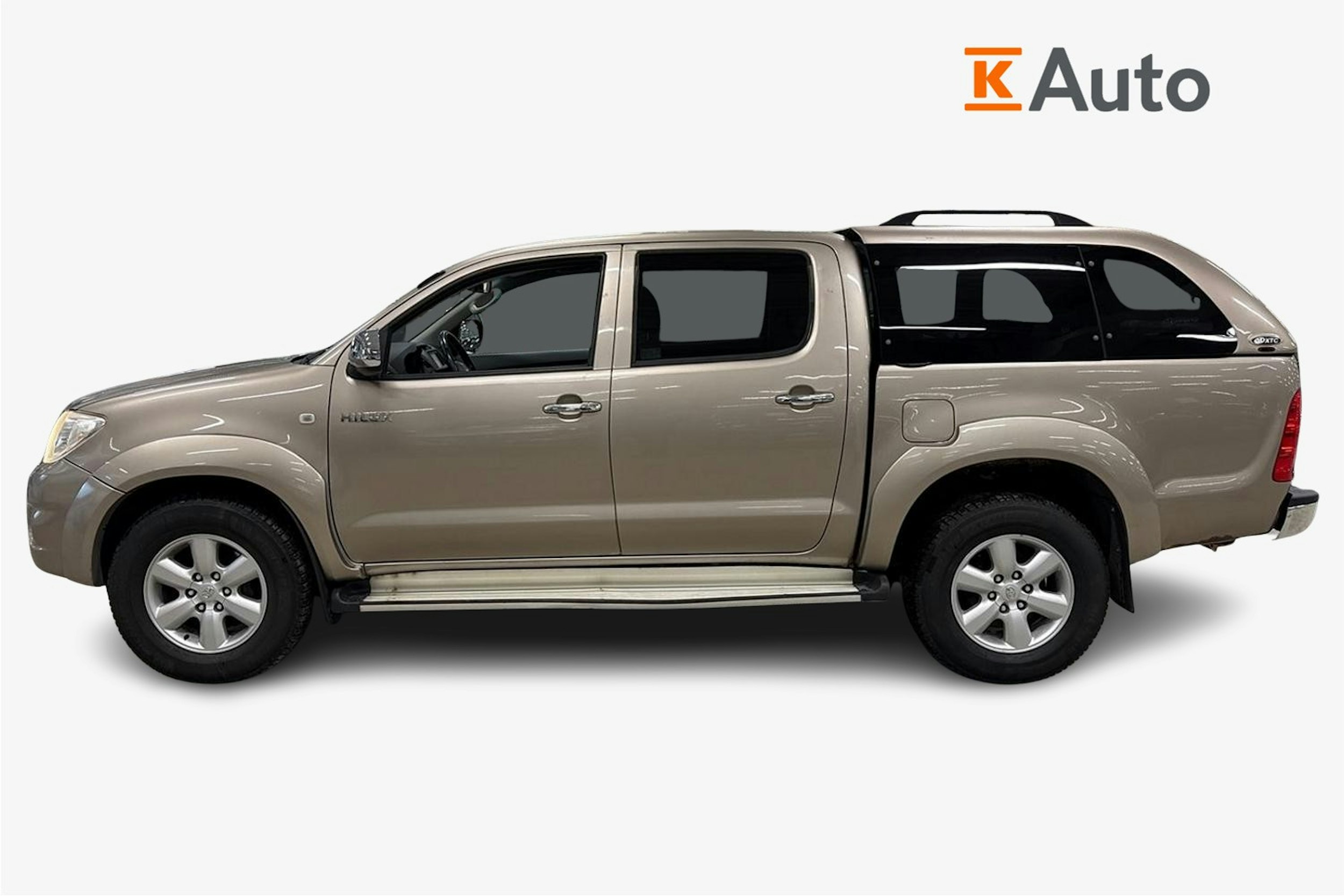 Ruskea (beige) Toyota Hilux 2010 kuva 7.