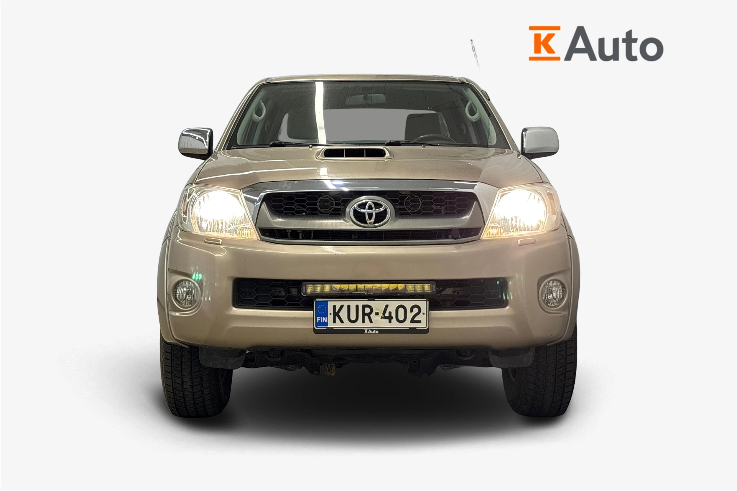 ruskea (beige) Toyota Hilux 2010 kuva 4.