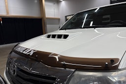 valkoinen Toyota Hilux 2012 kuva 26.