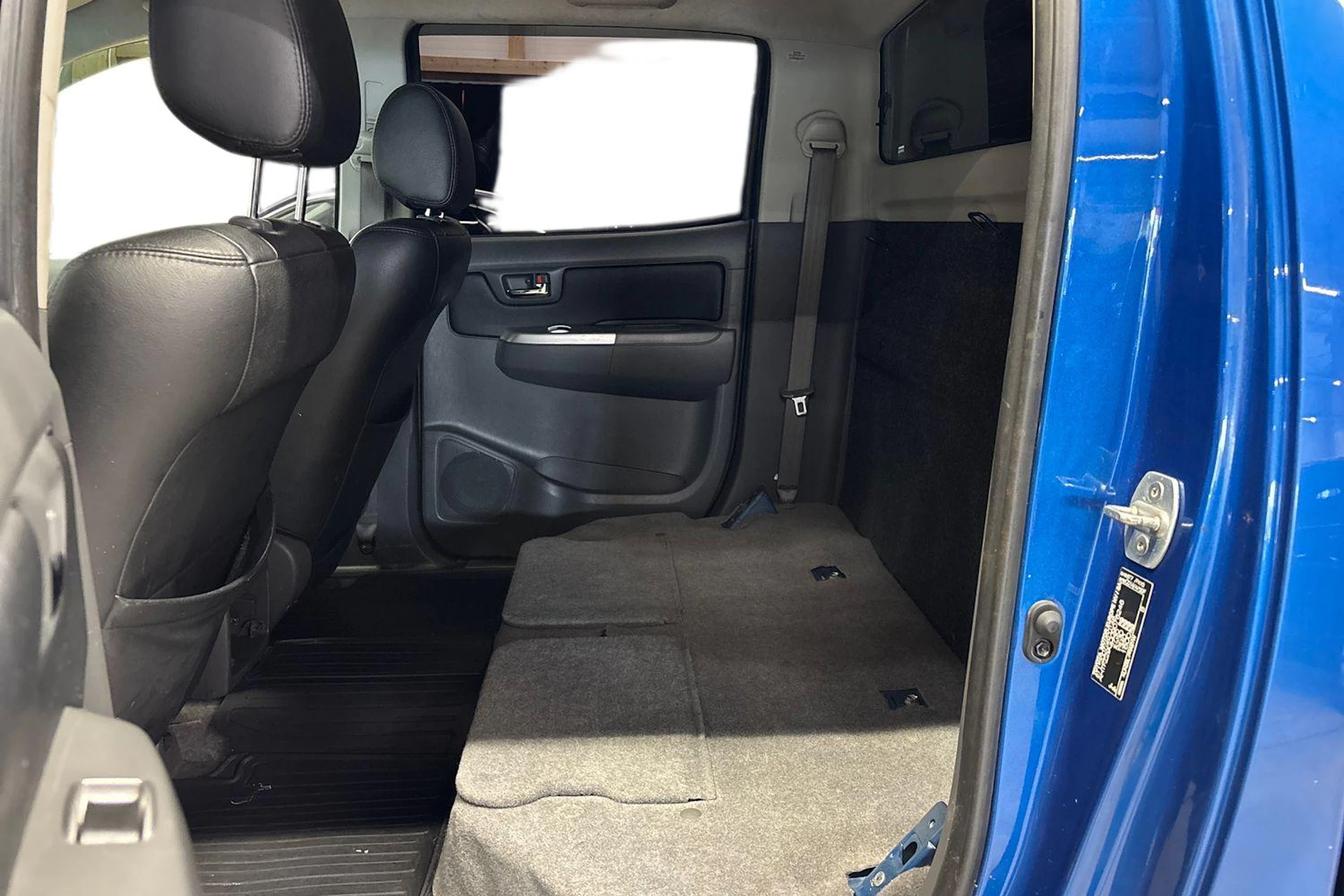 sininen Toyota Hilux 2012 kuva 11.
