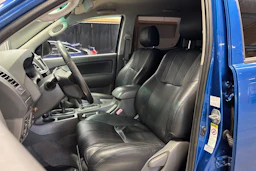 sininen Toyota Hilux 2012 kuva 16.