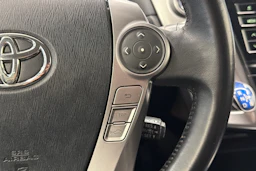 Valkoinen Toyota Prius+ 2019 kuva 14.