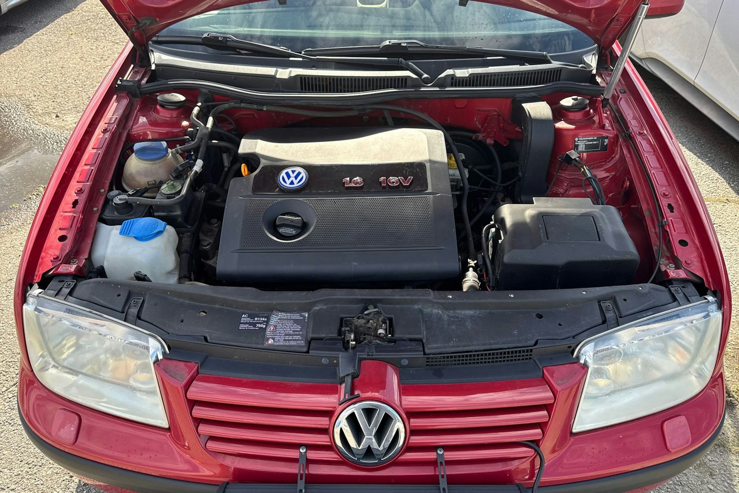 punainen Volkswagen Bora 2002 kuva 20.