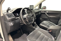 Valkoinen Volkswagen Caddy 2018 kuva 6.
