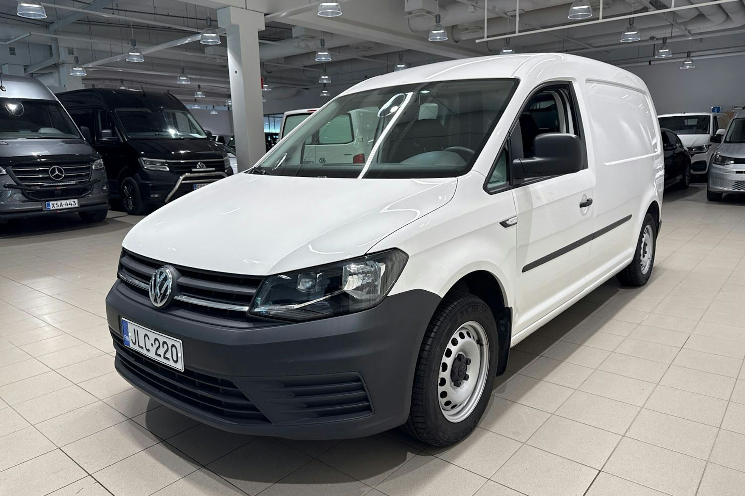 Valkoinen Volkswagen Caddy 2019 kuva 13.