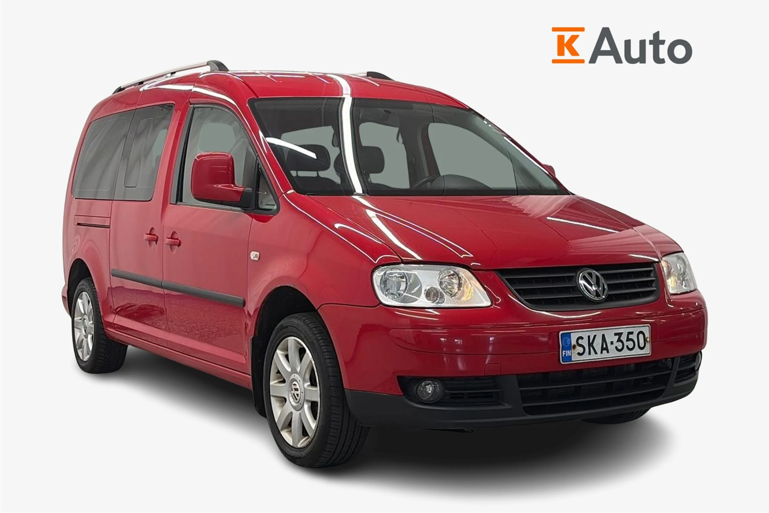 Punainen Volkswagen Caddy Maxi 2010 kuva 1.