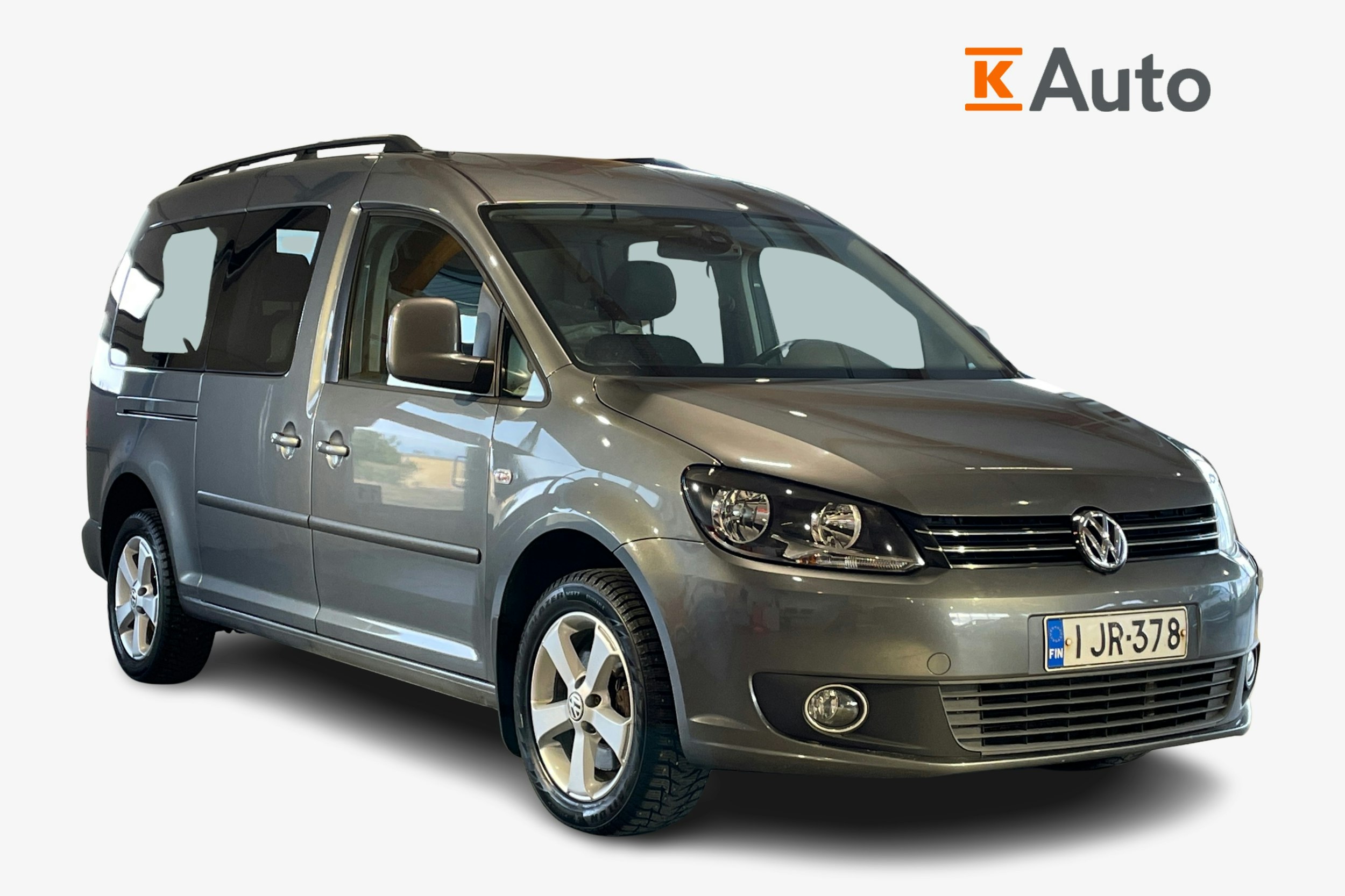 Vihreä Volkswagen Caddy Maxi 2011 kuva 1.