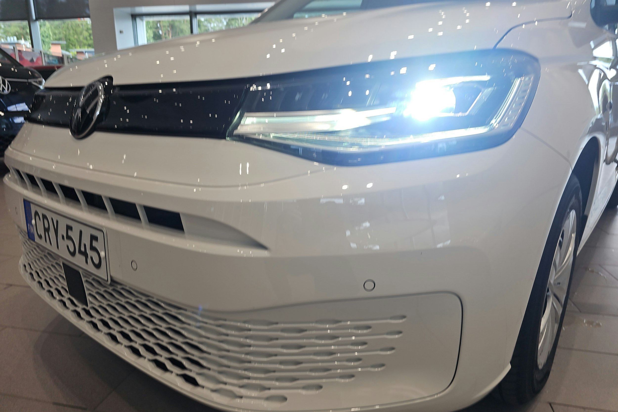 valkoinen Volkswagen Caddy Maxi 2025 kuva 12.