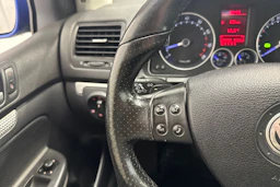sininen Volkswagen Golf 2007 kuva 14.