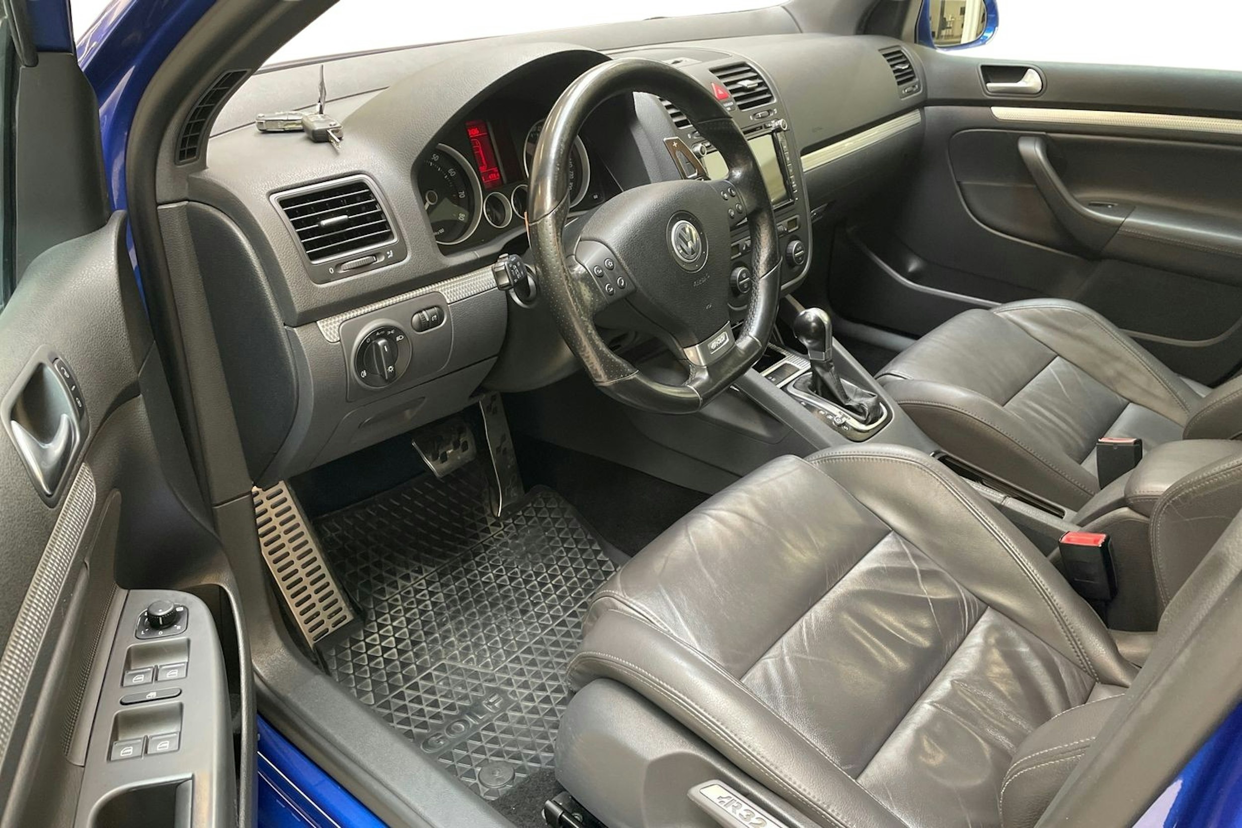 sininen Volkswagen Golf 2008 kuva 7.