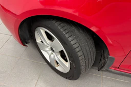 punainen Volkswagen Golf 2010 kuva 10.