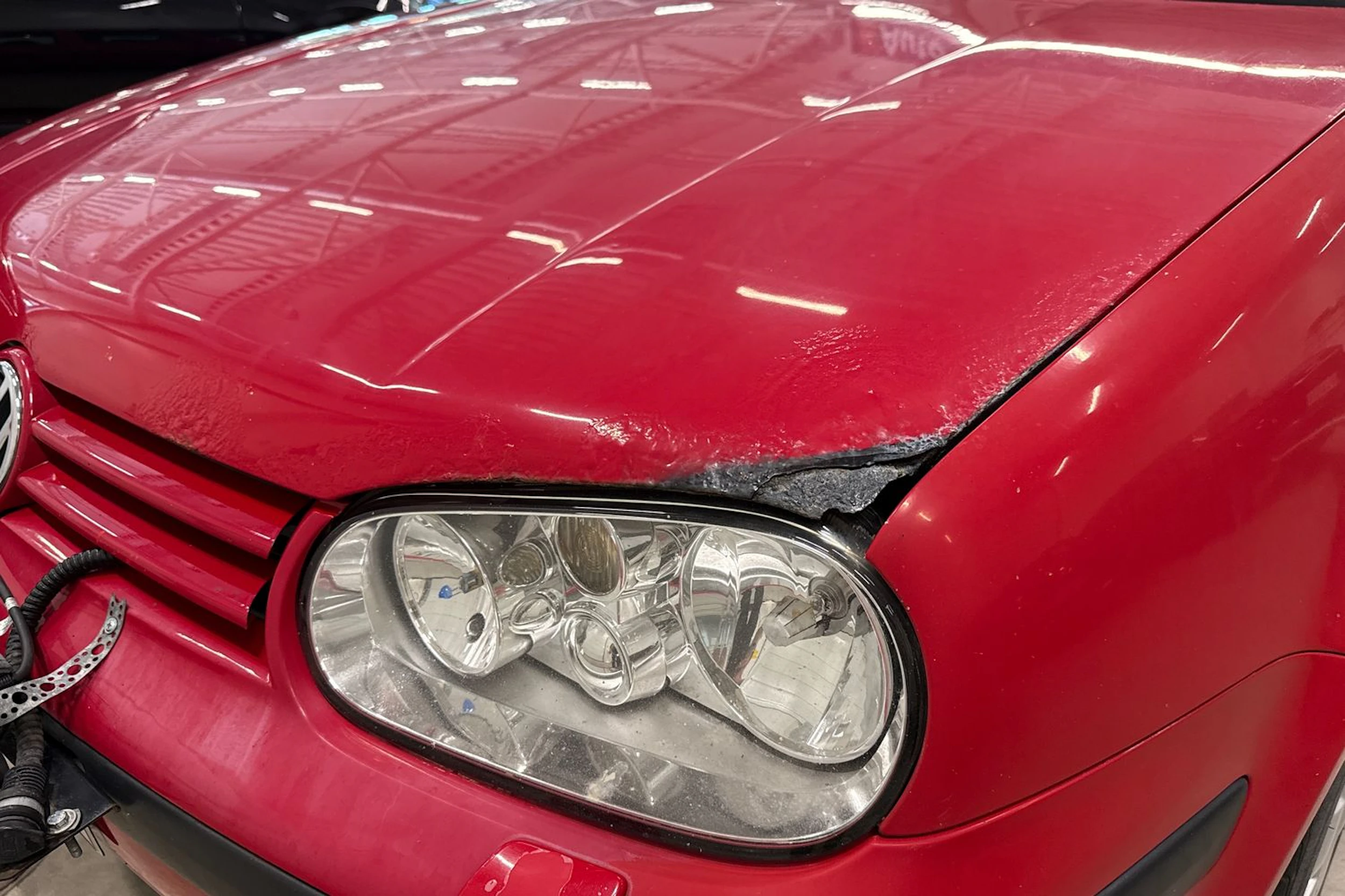 punainen Volkswagen Golf 2003 kuva 23.