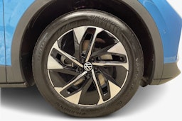 sininen Volkswagen ID.4 2025 kuva 9.