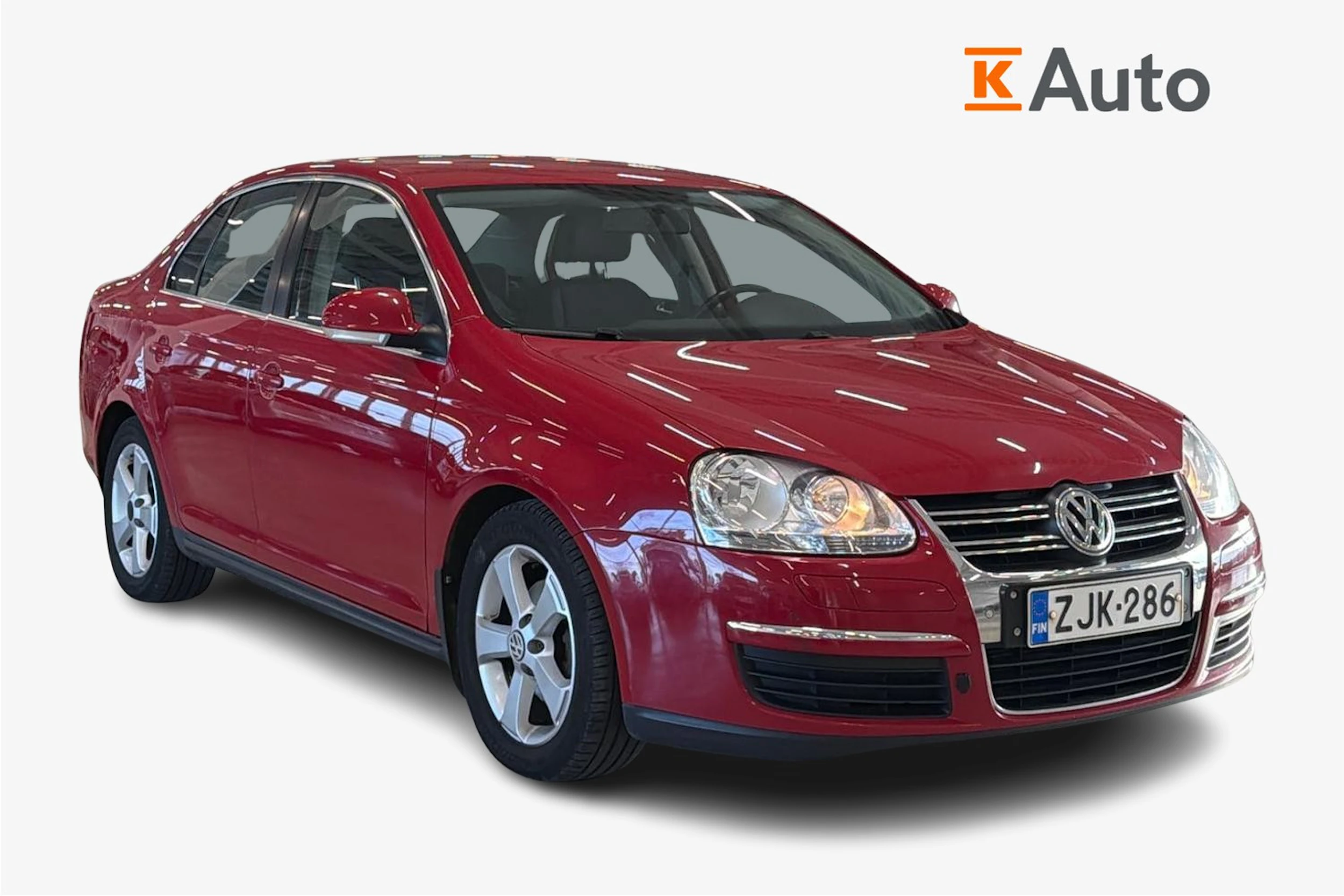 punainen Volkswagen Jetta 2010 kuva 1.