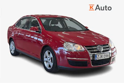 punainen Volkswagen Jetta 2010 kuva 1.