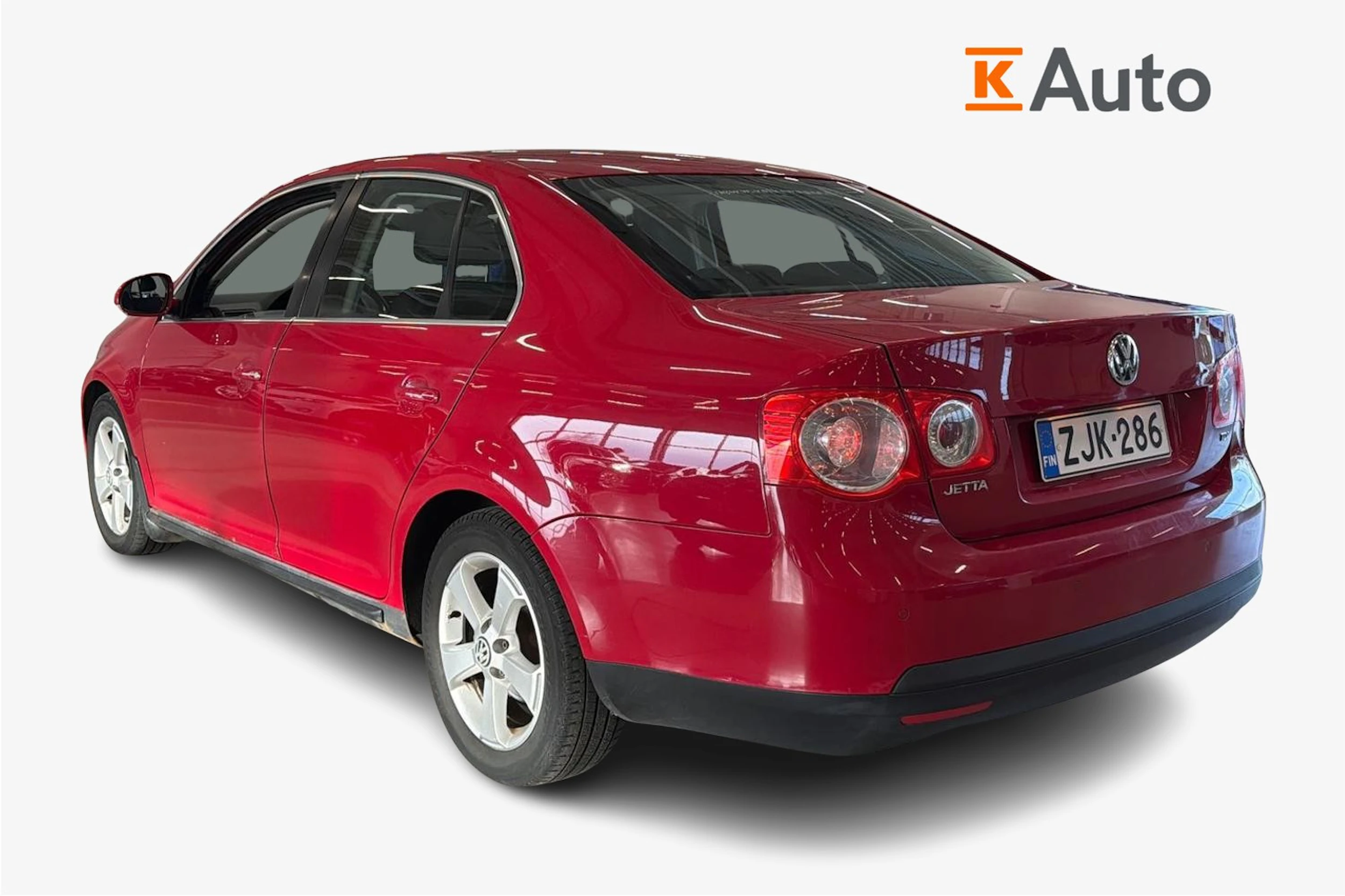 punainen Volkswagen Jetta 2010 kuva 2.