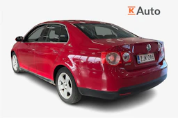 punainen Volkswagen Jetta 2010 kuva 2.