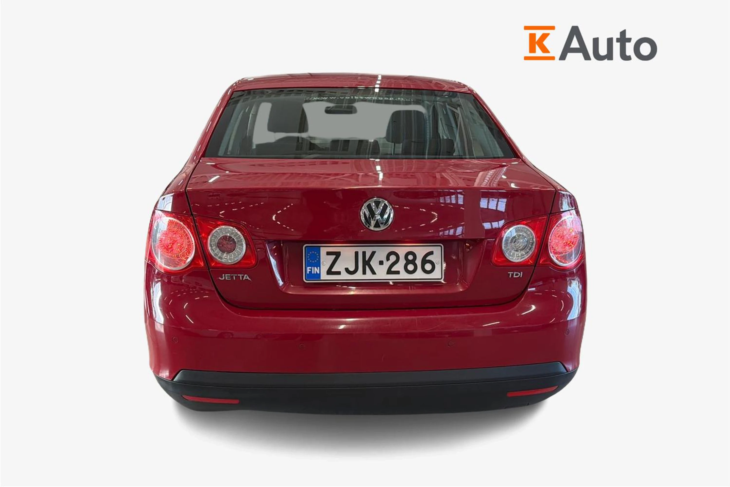 punainen Volkswagen Jetta 2010 kuva 3.