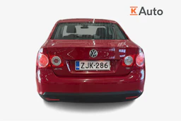 punainen Volkswagen Jetta 2010 kuva 3.
