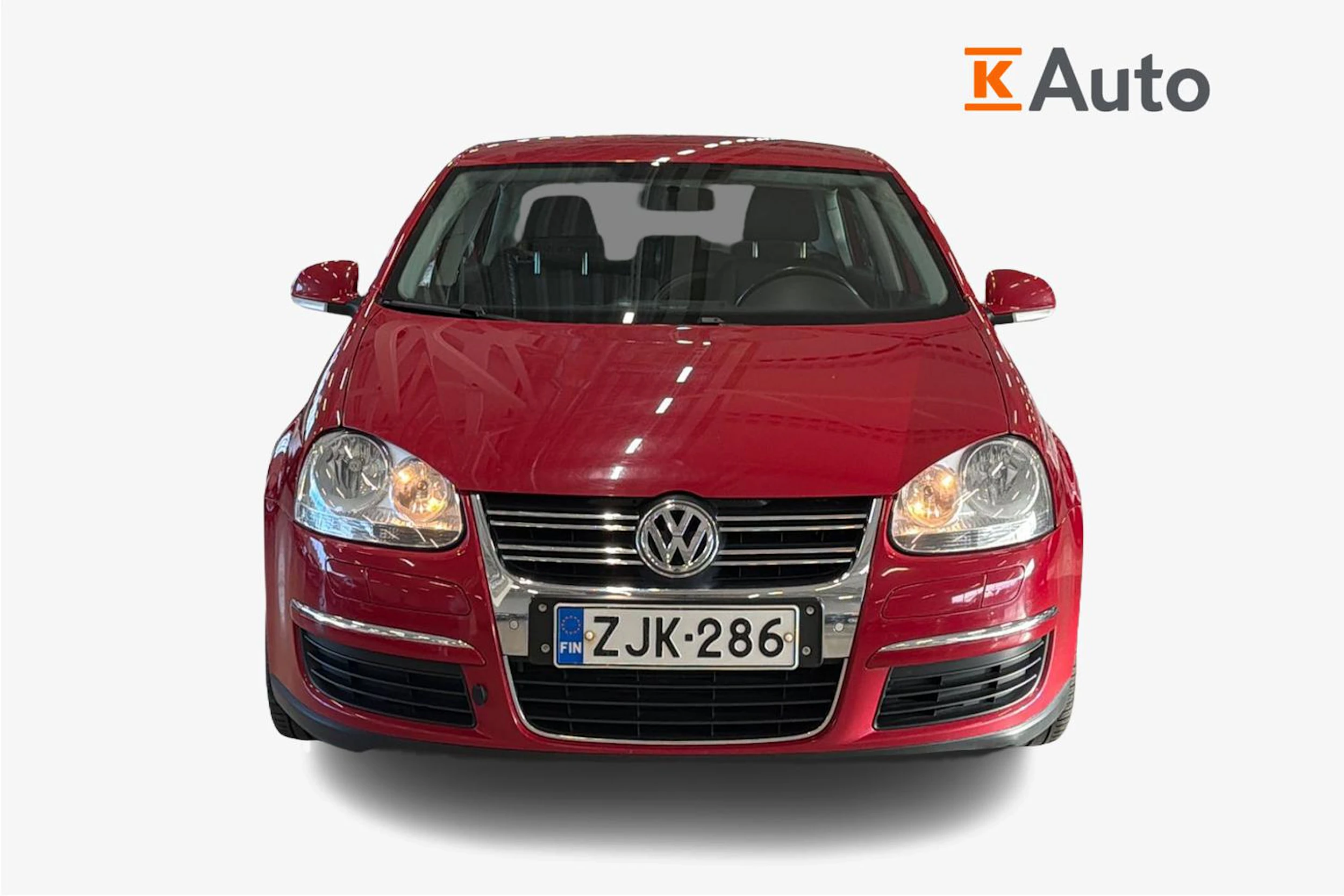 punainen Volkswagen Jetta 2010 kuva 4.