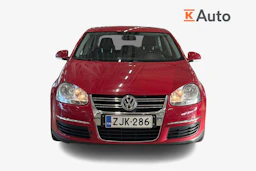 punainen Volkswagen Jetta 2010 kuva 4.