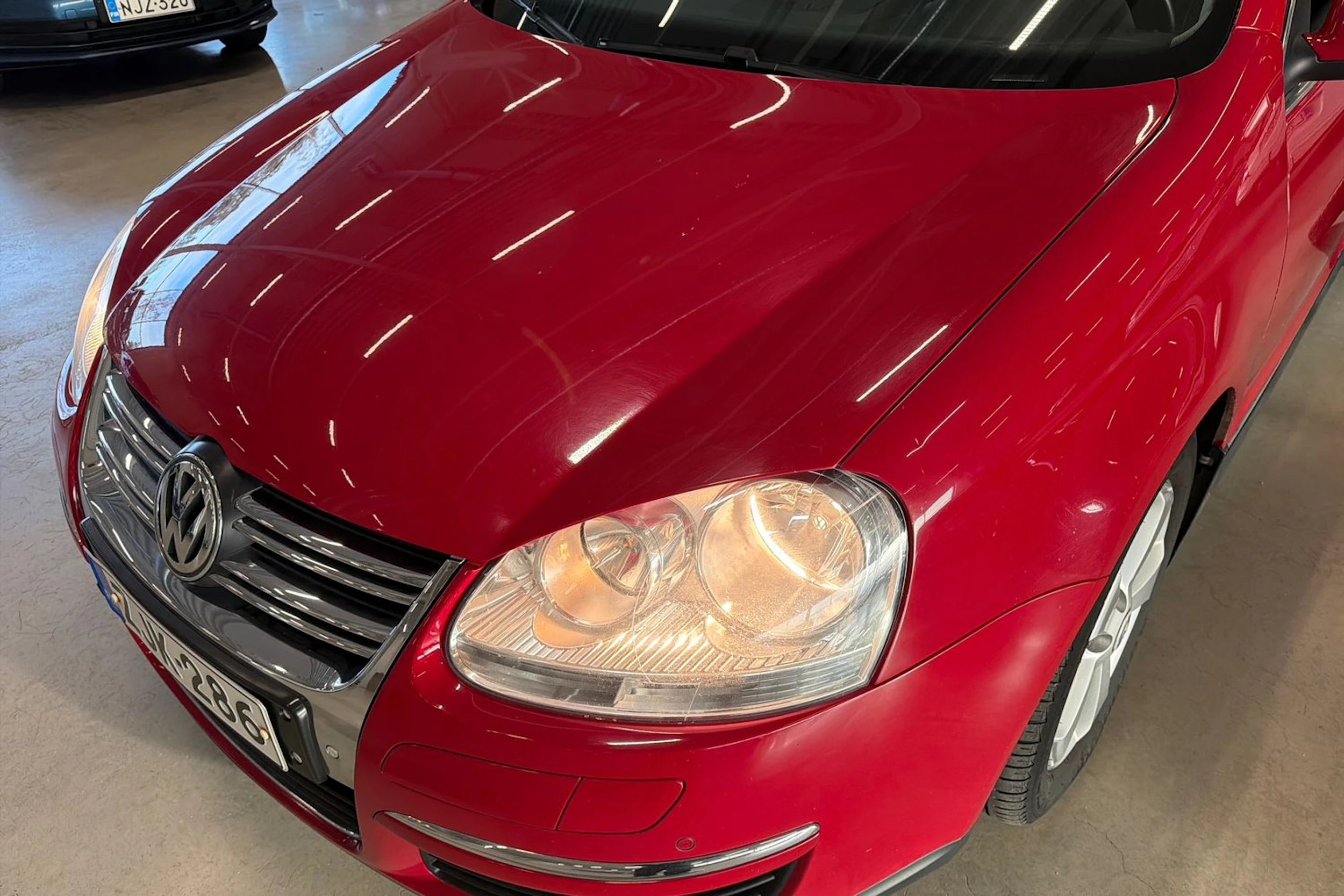 punainen Volkswagen Jetta 2010 kuva 28.