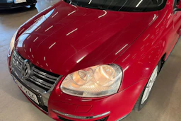punainen Volkswagen Jetta 2010 kuva 28.