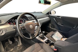 sininen Volkswagen Passat 2009 kuva 6.