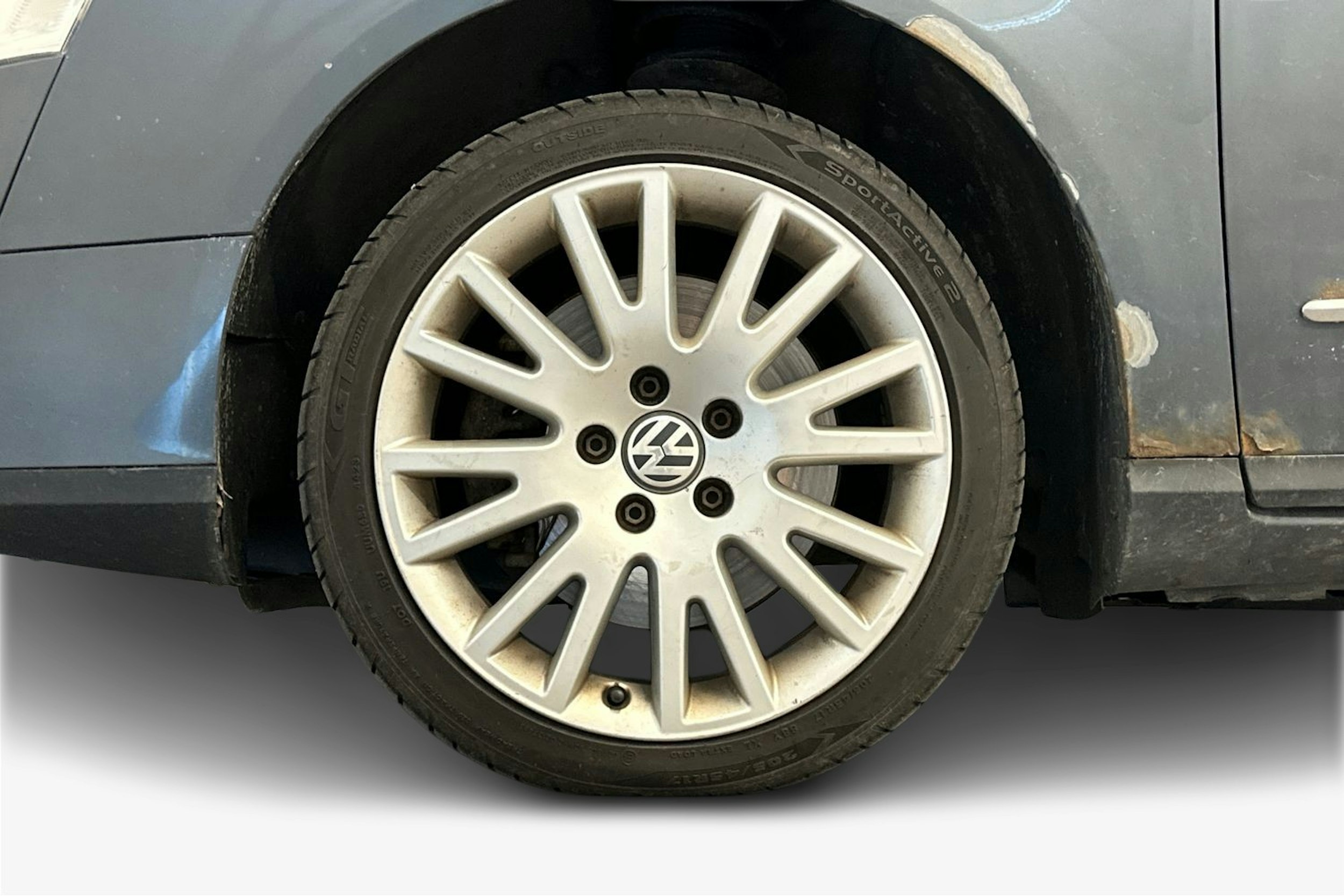 sininen Volkswagen Passat 2009 kuva 9.