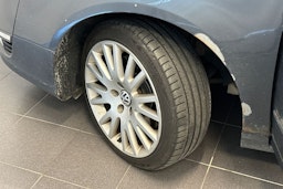 sininen Volkswagen Passat 2009 kuva 10.