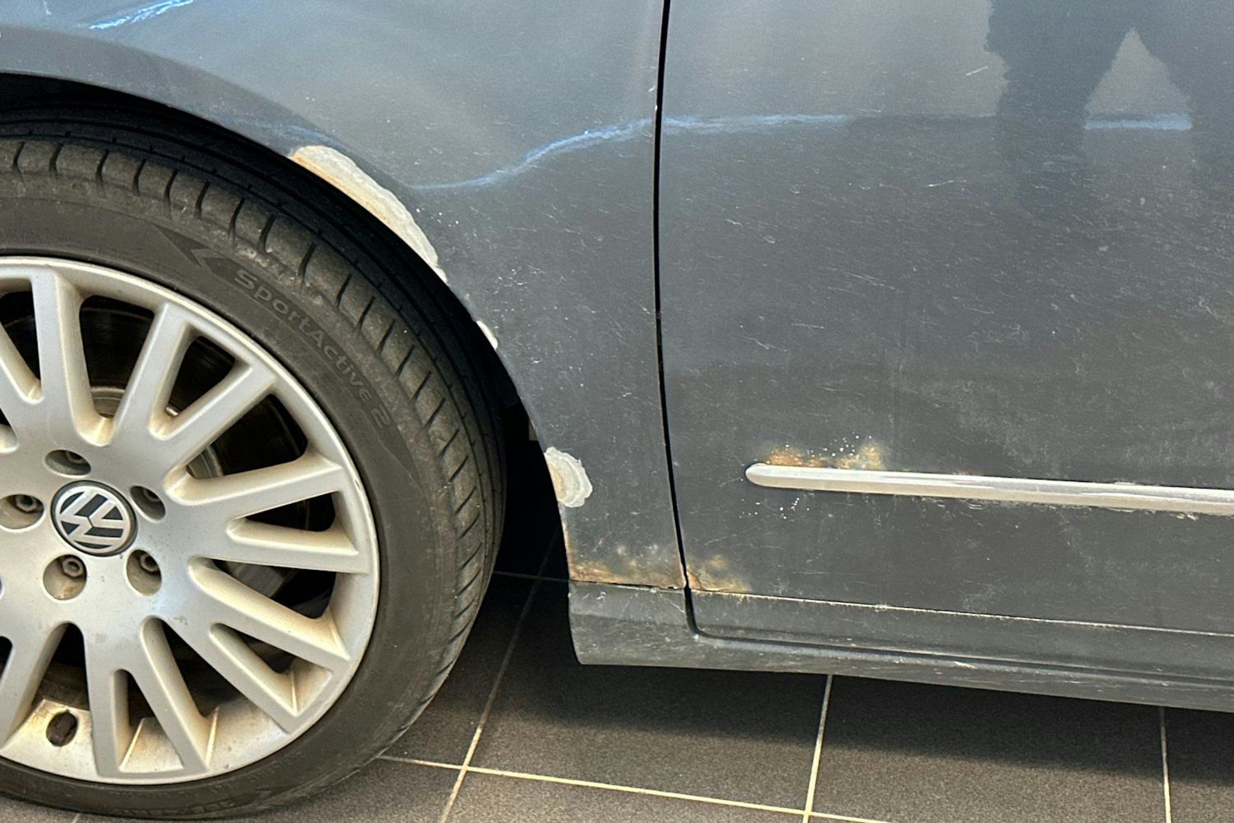 sininen Volkswagen Passat 2009 kuva 25.