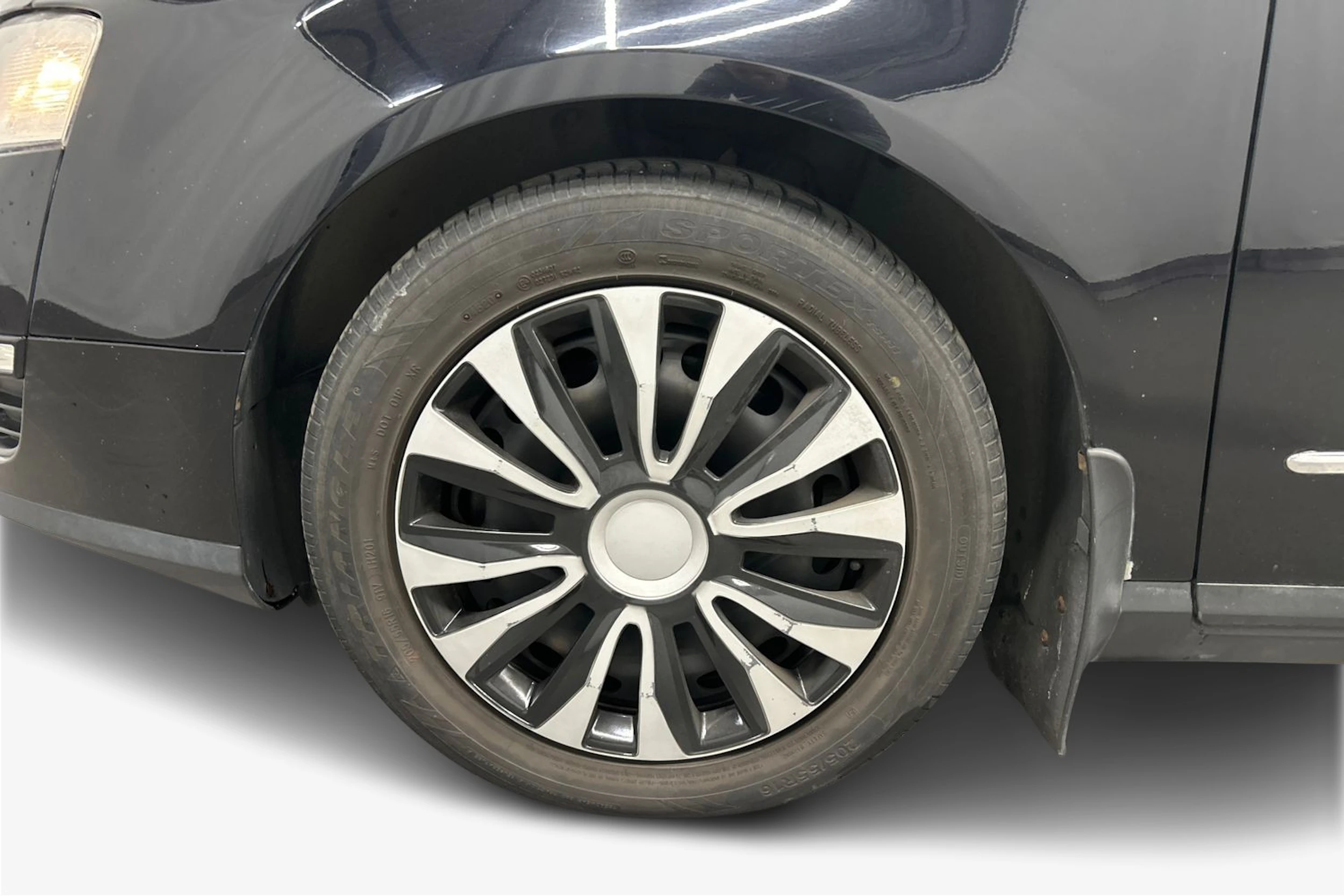 musta Volkswagen Passat 2009 kuva 9.