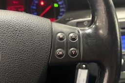 sininen Volkswagen Passat 2006 kuva 13.