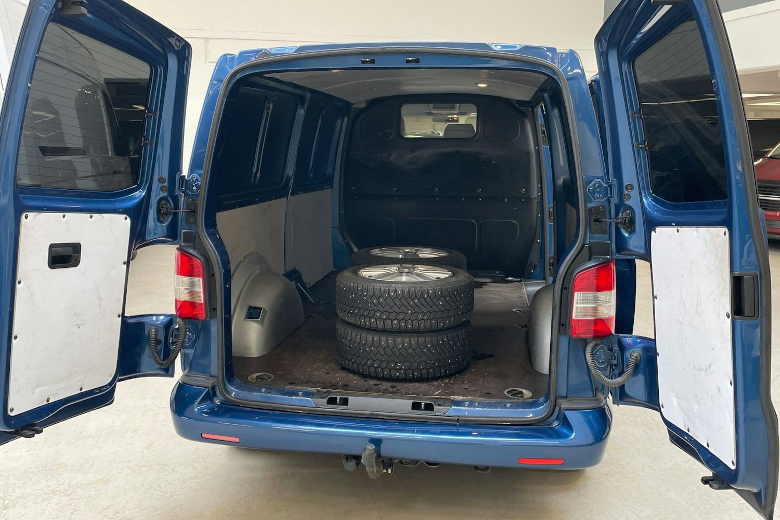 sininen Volkswagen Transporter 2009 kuva 14.