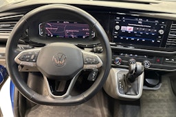 sininen Volkswagen Transporter 2024 kuva 7.