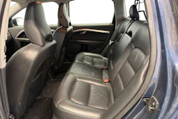 sininen Volvo V70 2010 kuva 7.