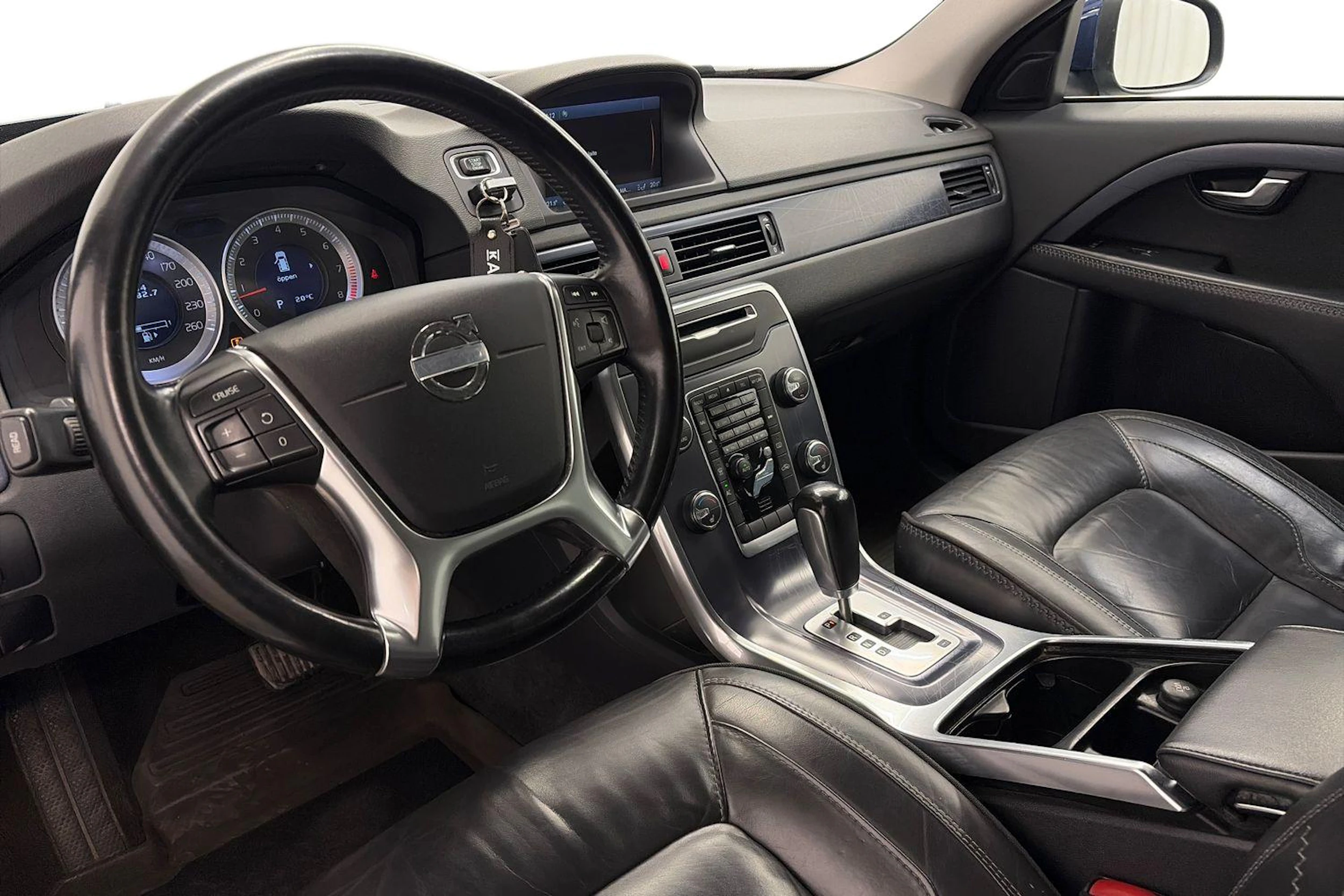 Sininen Volvo V70 2012 kuva 6.