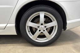 valkoinen Volvo V70 2013 kuva 27.