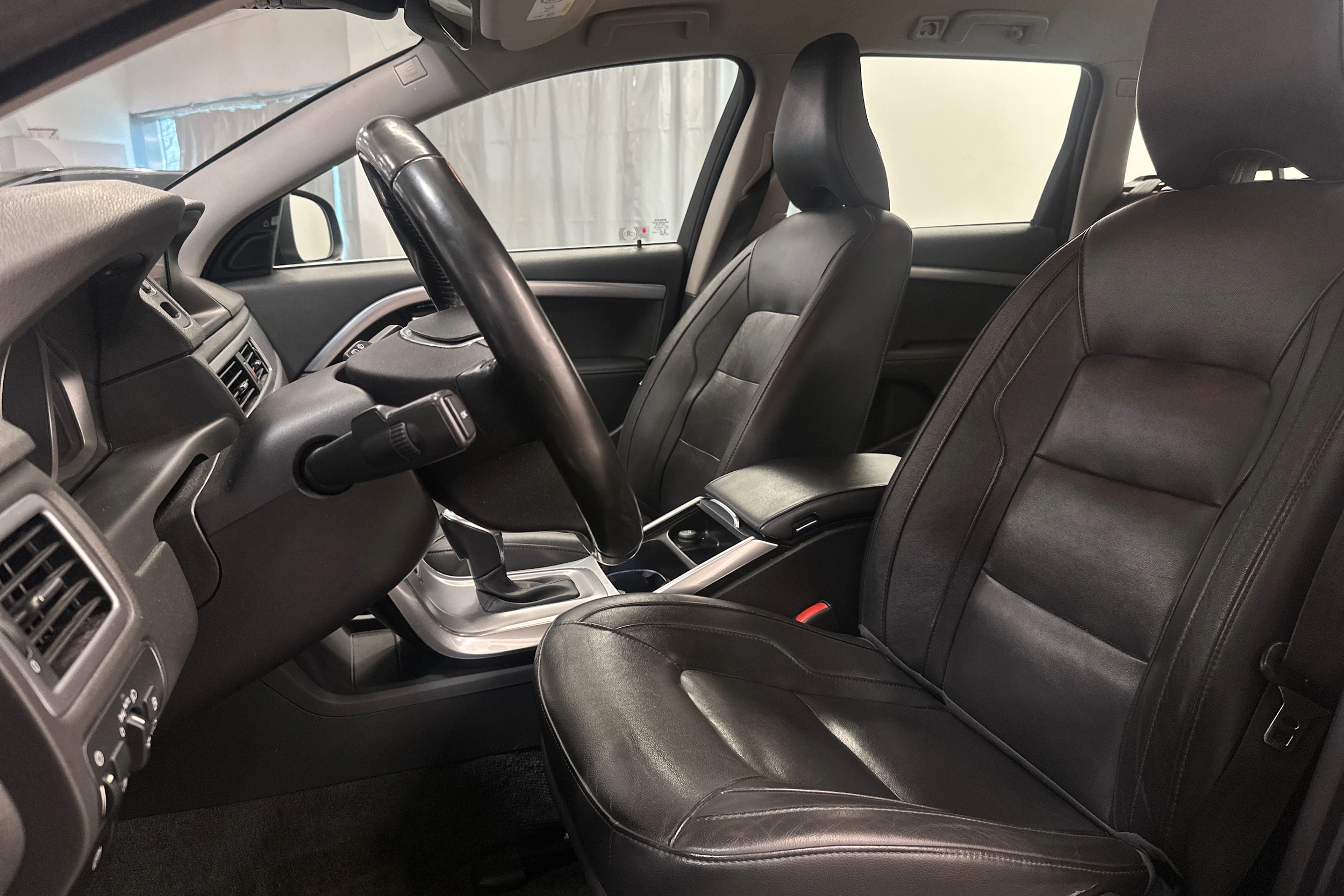 Sininen Volvo V70 2016 kuva 11.