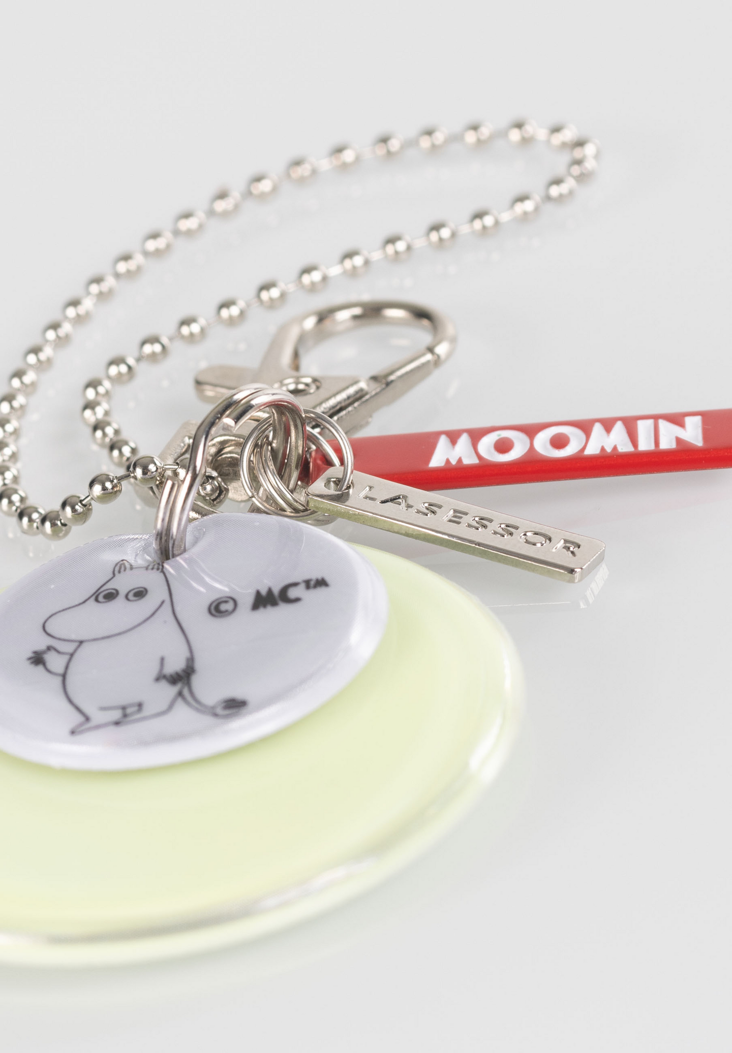 Lasessor X Moomin 2-osainen Design hohtoheijastin Muumipeikko