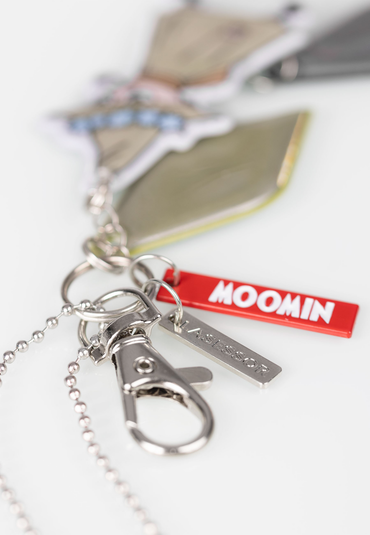 Lasessor X Moomin Design koruheijastin Nuuskamuikkunen