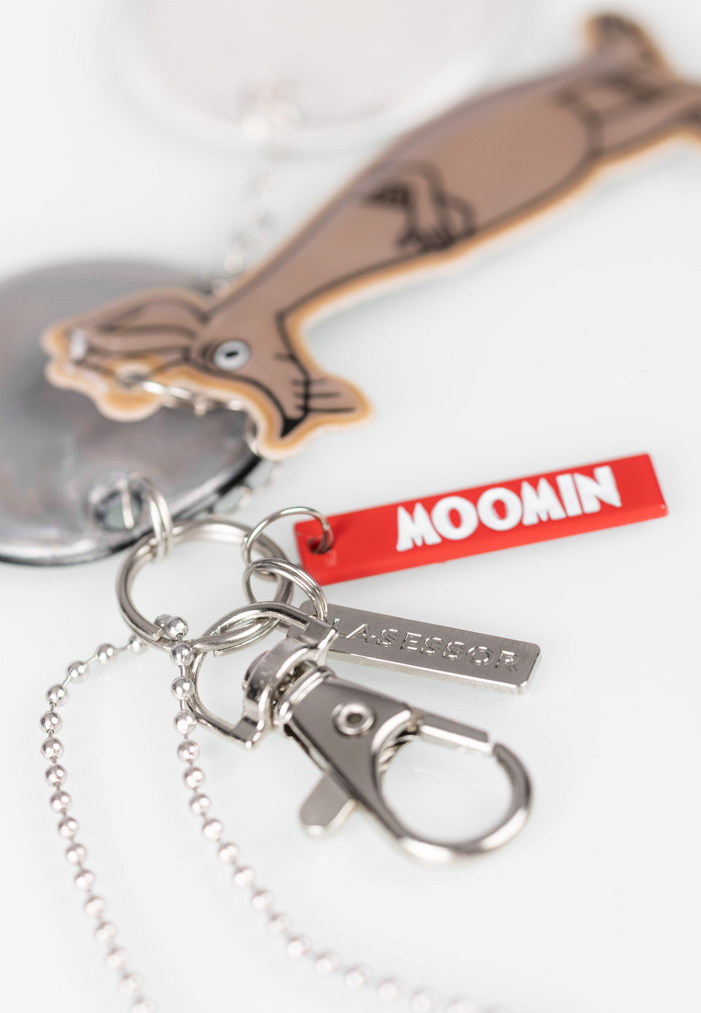 Lasessor X Moomin Design koruheijastin Nipsu