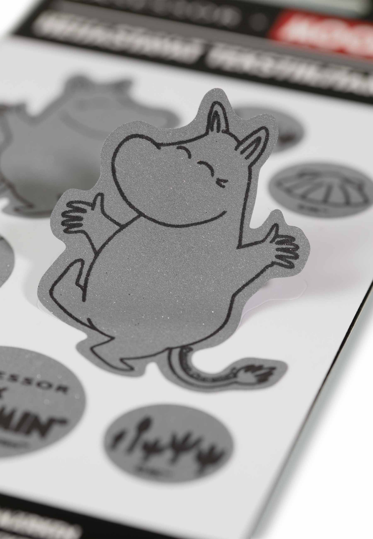 Lasessor X Moomin heijastava tekstiilitarrasetti Muumipeikko