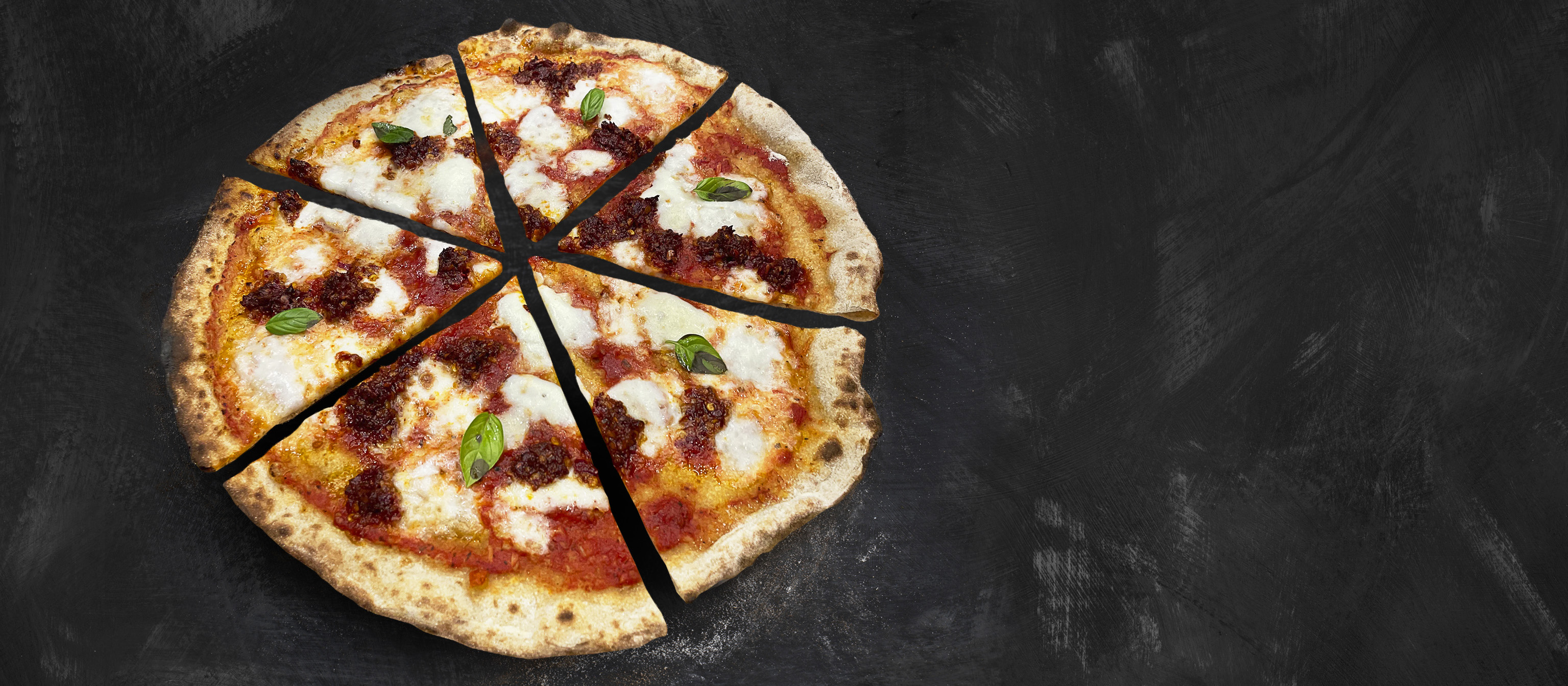 Pizzanpaistajien ohut ja rapea pizzapohja